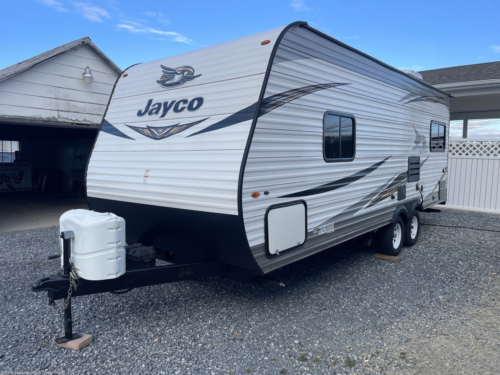 2019 Jayco Jay Flight SLX 212QB - Used Travel Trailer For Sale by Alexander RV & Trailer Center in Clayton, Delaware features Diamond Shield Paint Protection Film, Microwave, Refrigerator, Stabilizer Jacks, Converter
