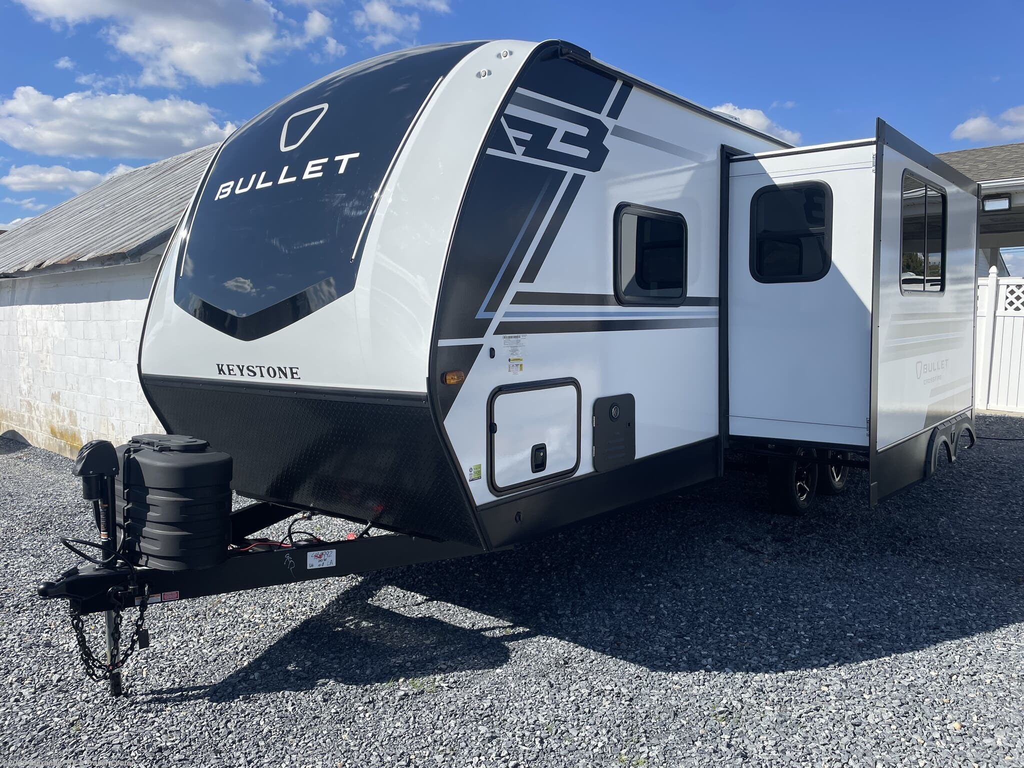 2026 Keystone Bullet Crossfire East 2290BH - New Travel Trailer For Sale by Alexander RV & Trailer Center in Clayton, Delaware features Power Hitch Jack, Shower, Skylight, Ladder, Slam Latch Baggage Doors
