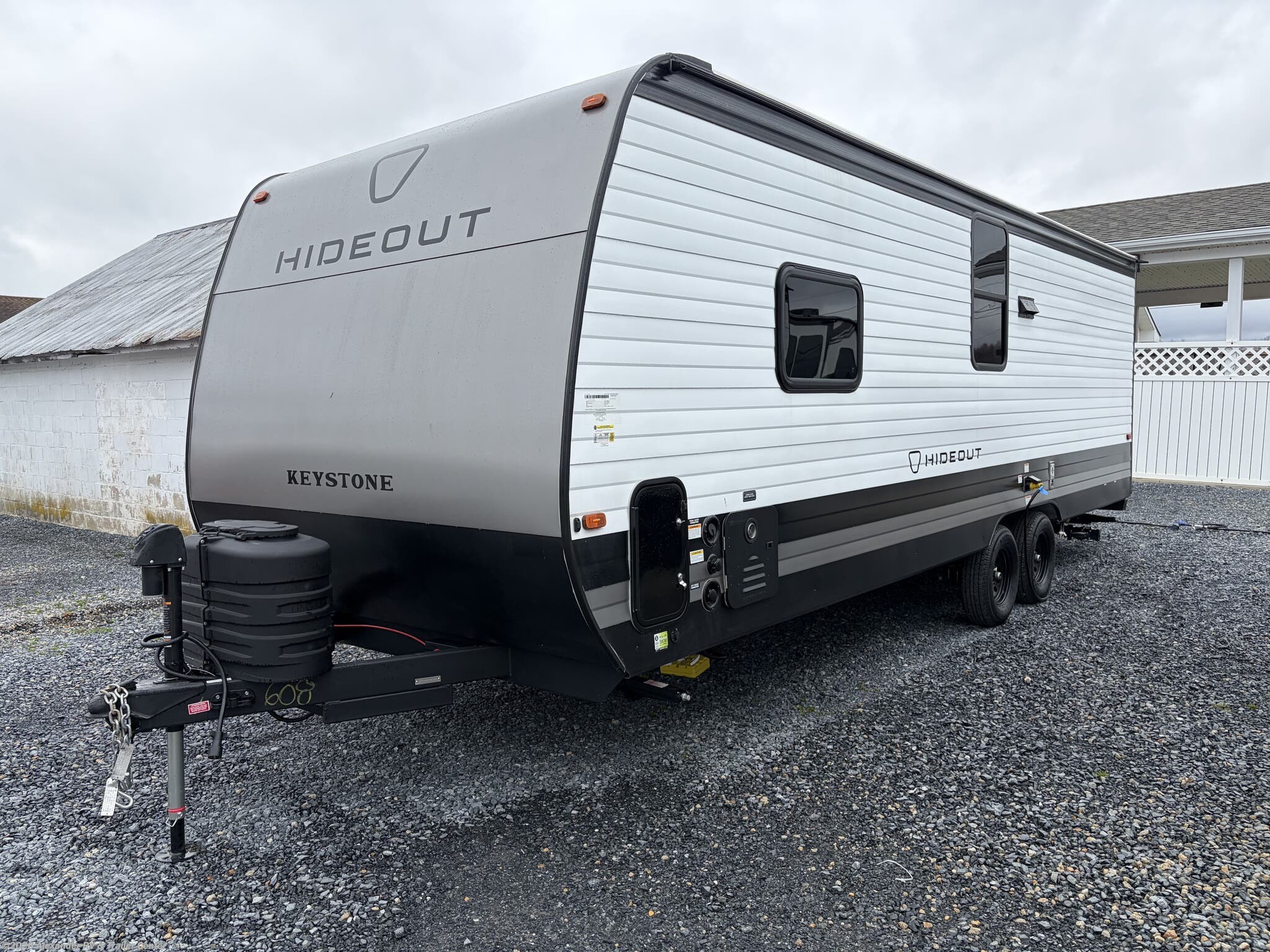 2026 Keystone Hideout 230BH - New Travel Trailer For Sale by Alexander RV & Trailer Center in Clayton, Delaware features Pass Thru Storage, Tankless Demand Gas Water Heater, Propane, Air Conditioning, Booth Dinette