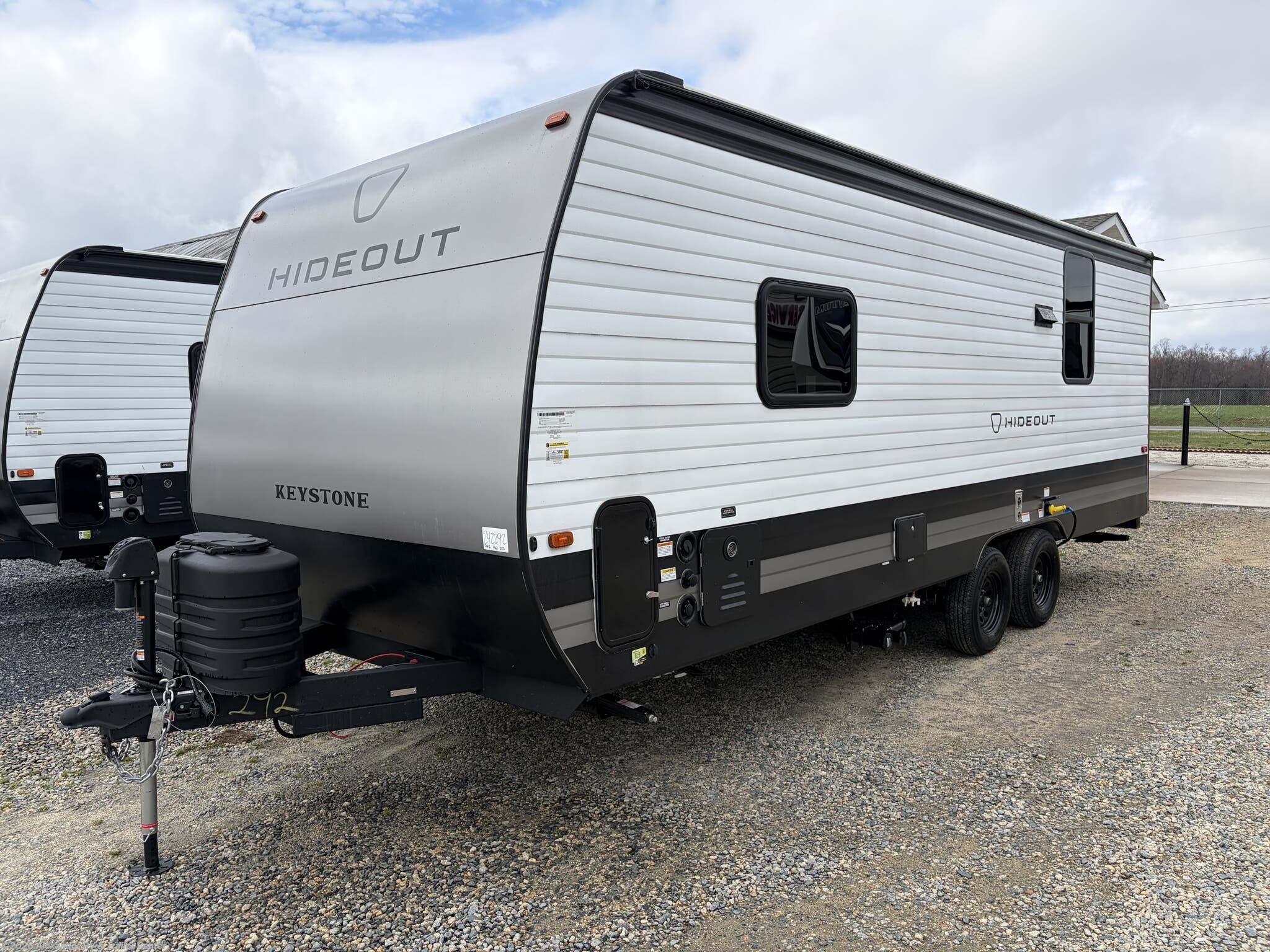 2026 Keystone Hideout 210RL - New Travel Trailer For Sale by Alexander RV & Trailer Center in Clayton, Delaware features Stove Top Burner, Diamond Shield Paint Protection Film, Toilet, Auxiliary Battery, LP Detector