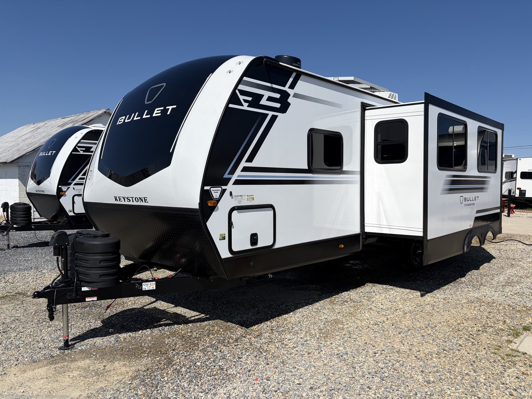 2026 Keystone Bullet Crossfire 260RBS - New Travel Trailer For Sale by Alexander RV & Trailer Center in Clayton, Delaware features Slideout, Roof Vent, Refrigerator (12V), LP Detector, Queen Bed