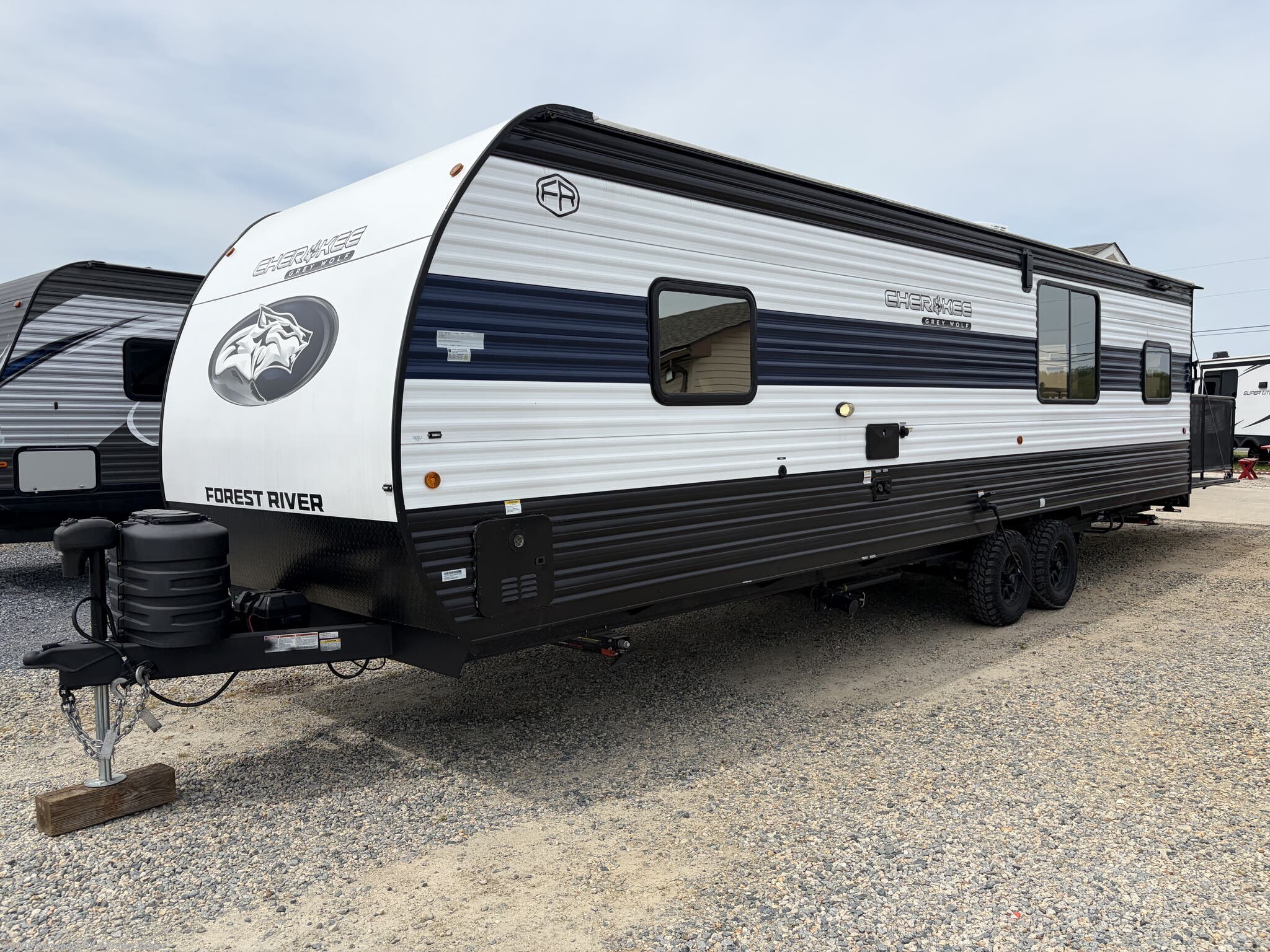 2025 Forest River Cherokee Grey Wolf 24RRT - Used Toy Hauler For Sale by Alexander RV & Trailer Center in Clayton, Delaware features Converter, Fire Extinguisher, 30 Amp Service, Ramp, Detachable Power Cord