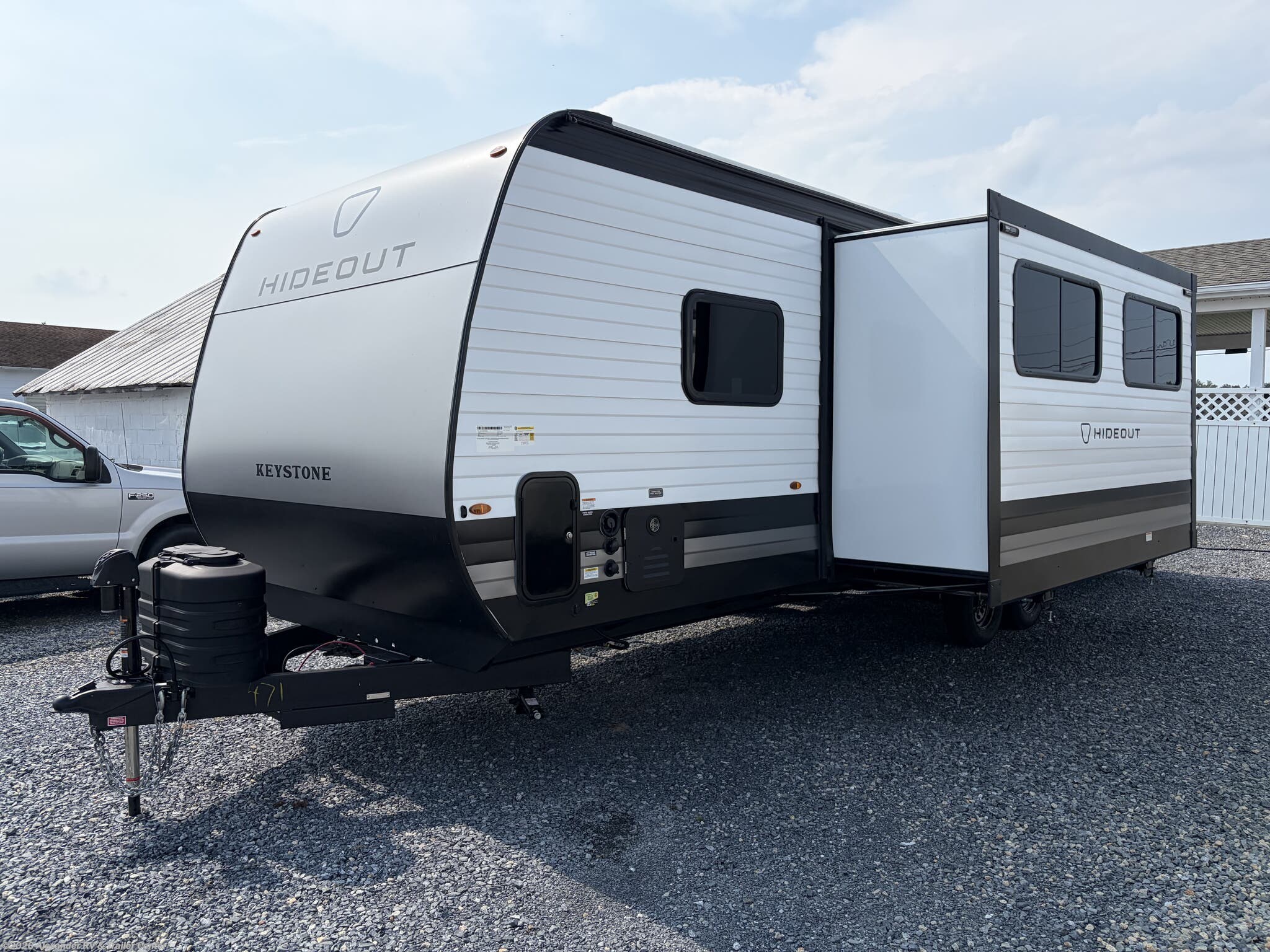 2027 Keystone Hideout 262BHS - New Travel Trailer For Sale by Alexander RV & Trailer Center in Clayton, Delaware features Refrigerator (12V), Smoke Detector, Booth Dinette, Converter, Tankless Demand Gas Water Heater