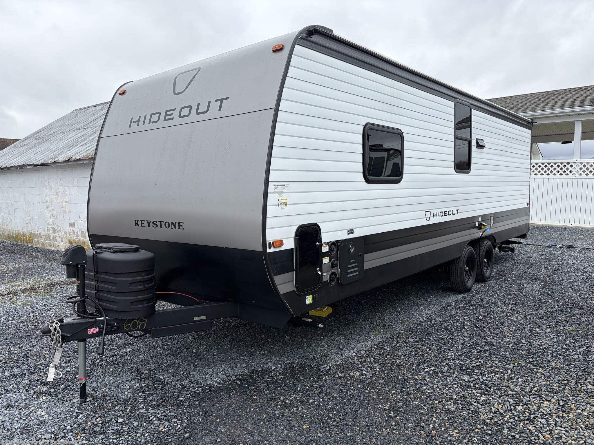 2027 Keystone Hideout 230BH - New Travel Trailer For Sale by Alexander RV & Trailer Center in Clayton, Delaware features Power Roof Vent, Auxiliary Battery, Black Tank Flush, Power Awning, LP Detector