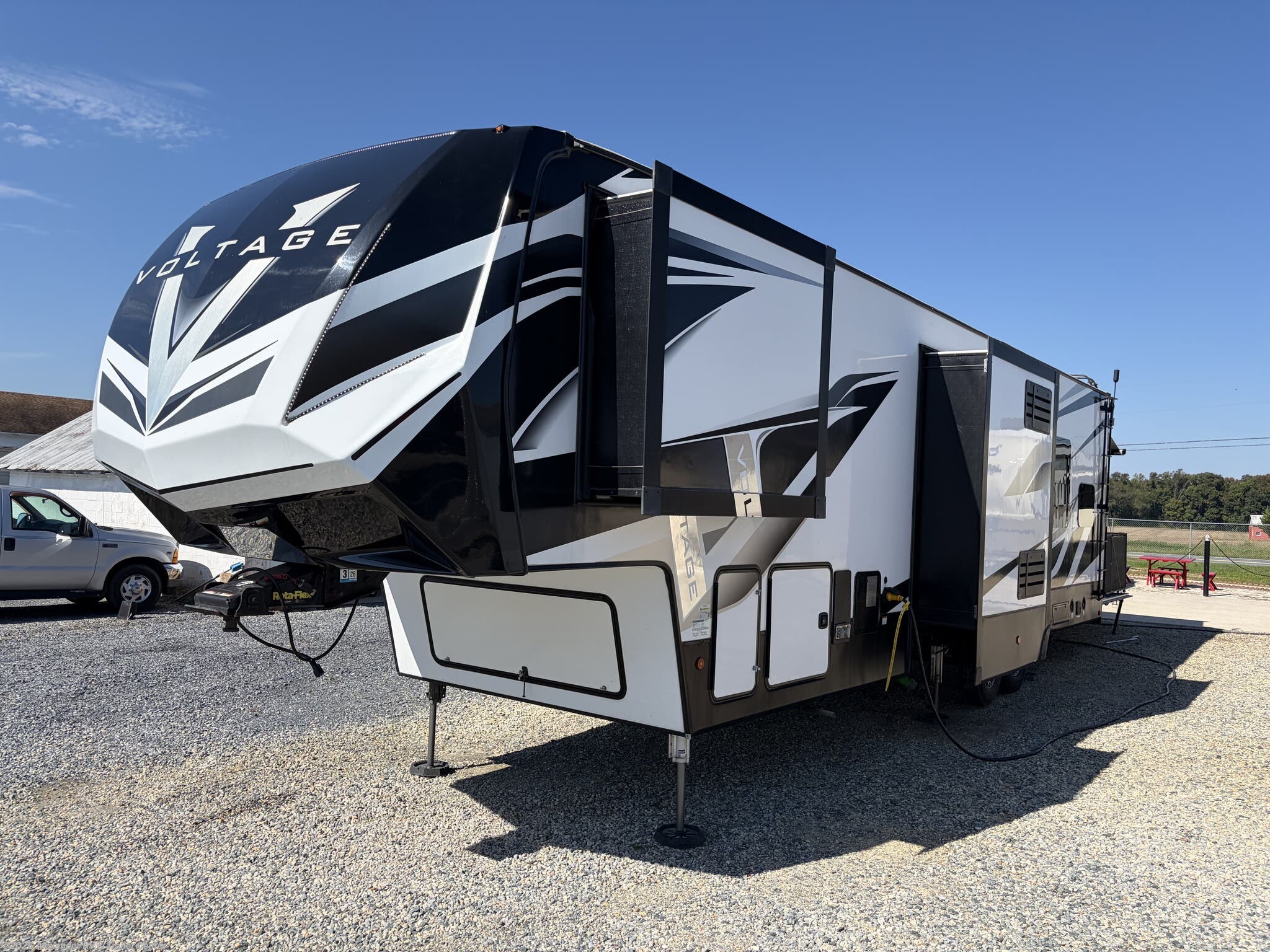 2021 Dutchmen Voltage 3615 - Used Toy Hauler For Sale by Alexander RV & Trailer Center in Clayton, Delaware features Ladder, Oven, Backup Camera, Upgraded Insulation Package, Water Heater