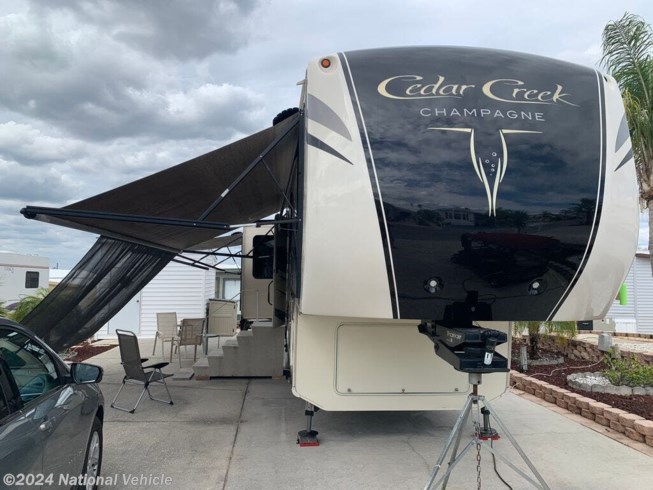 2016 Cedar Creek Champagne 38EL by Forest River from National Vehicle in Haines City, Florida