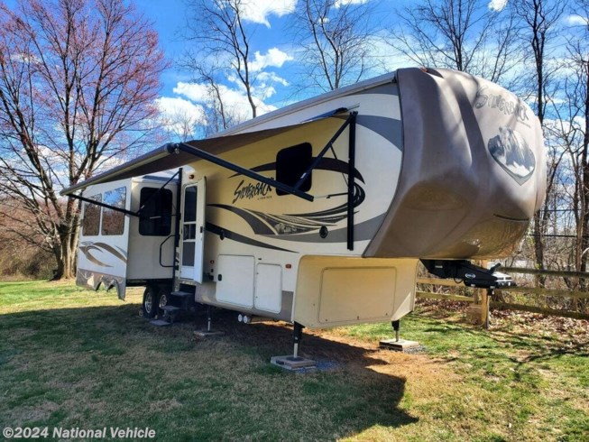 2015 Cedar Creek Silverback 31RK by Forest River from National Vehicle in Cooksville, Maryland