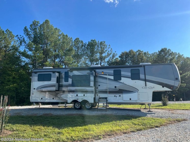 Used 2020 Forest River Cedar Creek Champagne 38ERD available in Bradenton, Florida