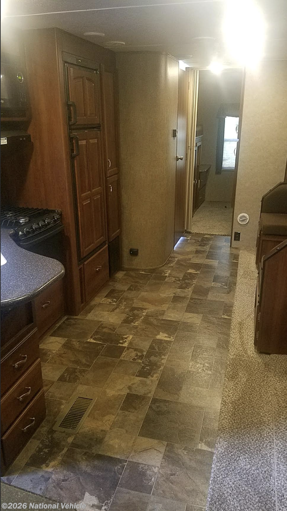 2015 Lacrosse Luxury Lite Touring 318BHS by Forest River from National Vehicle in Gary City, Texas