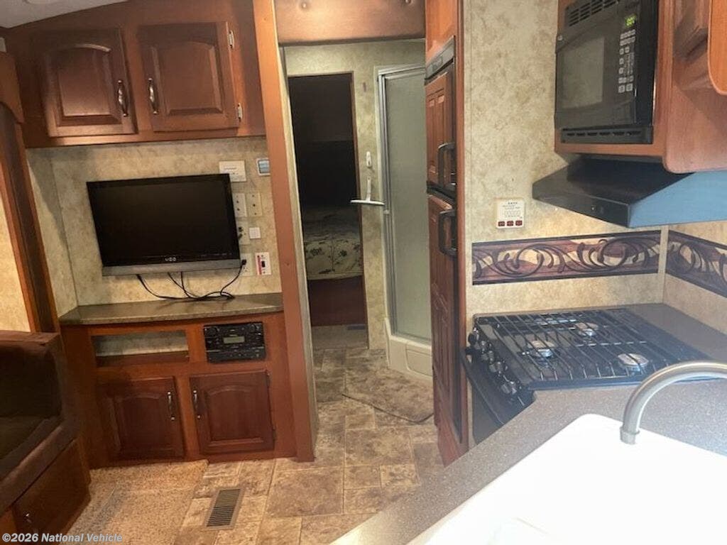 2012 Cougar 24RLS by Keystone from National Vehicle in Bunnell, Florida