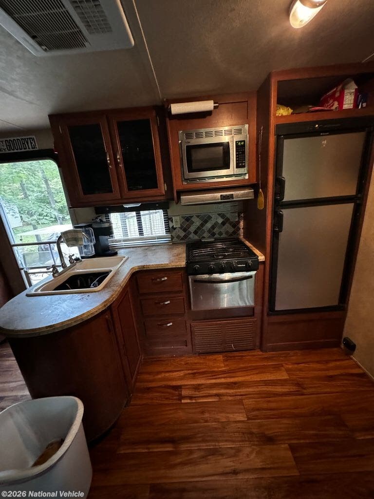 2016 Wildwood 31QBTS by Forest River from National Vehicle in Mora, Minnesota