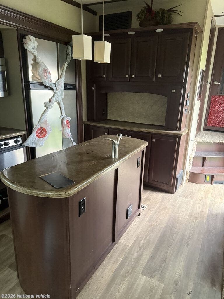 2014 Infinity 3210 RE by Dutchmen from National Vehicle in Villisca, Iowa