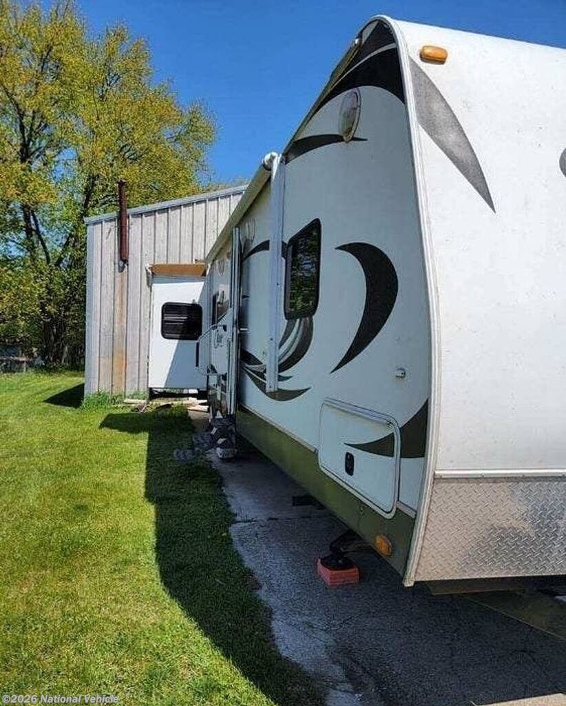 2013 Cougar 32RESWE by Keystone from National Vehicle in Elkhart, Indiana