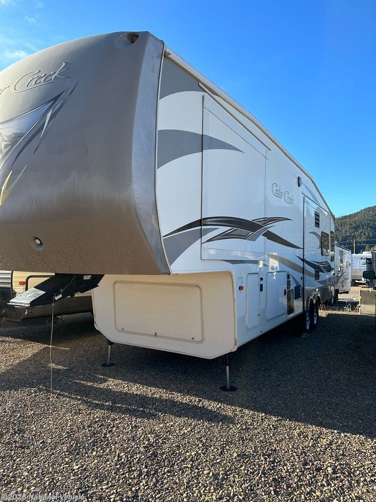 2014 Cedar Creek 30RL by Forest River from National Vehicle in Manhattan, Montana