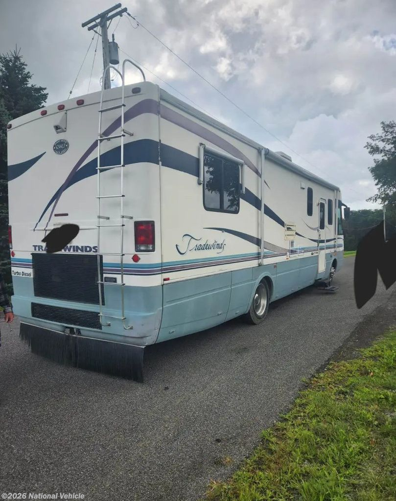 1998 Tradewinds 7370 by National RV from National Vehicle in Lowville, New York