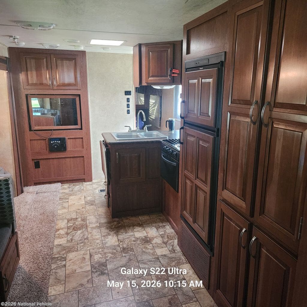 2010 Wildcat eXtraLite 30BHS by Forest River from National Vehicle in Black River Falls, Wisconsin