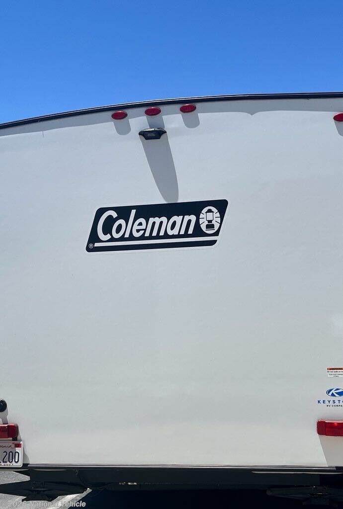2025 Keystone Coleman Light 17BX - Used Travel Trailer For Sale by National Vehicle in Riverside, California