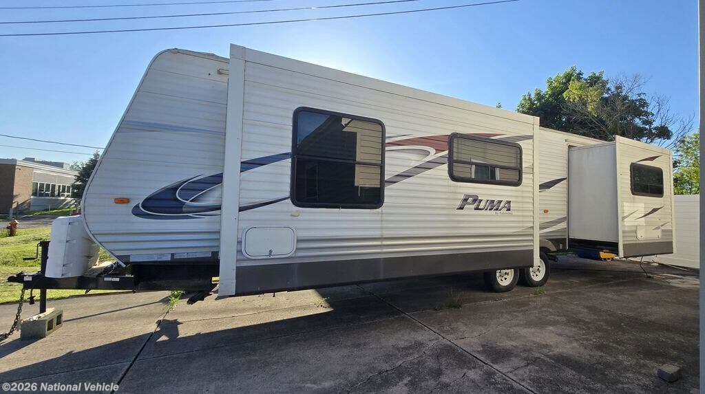 2014 Palomino Puma 31FKBS - Used Travel Trailer For Sale by National Vehicle in Lockport, New York