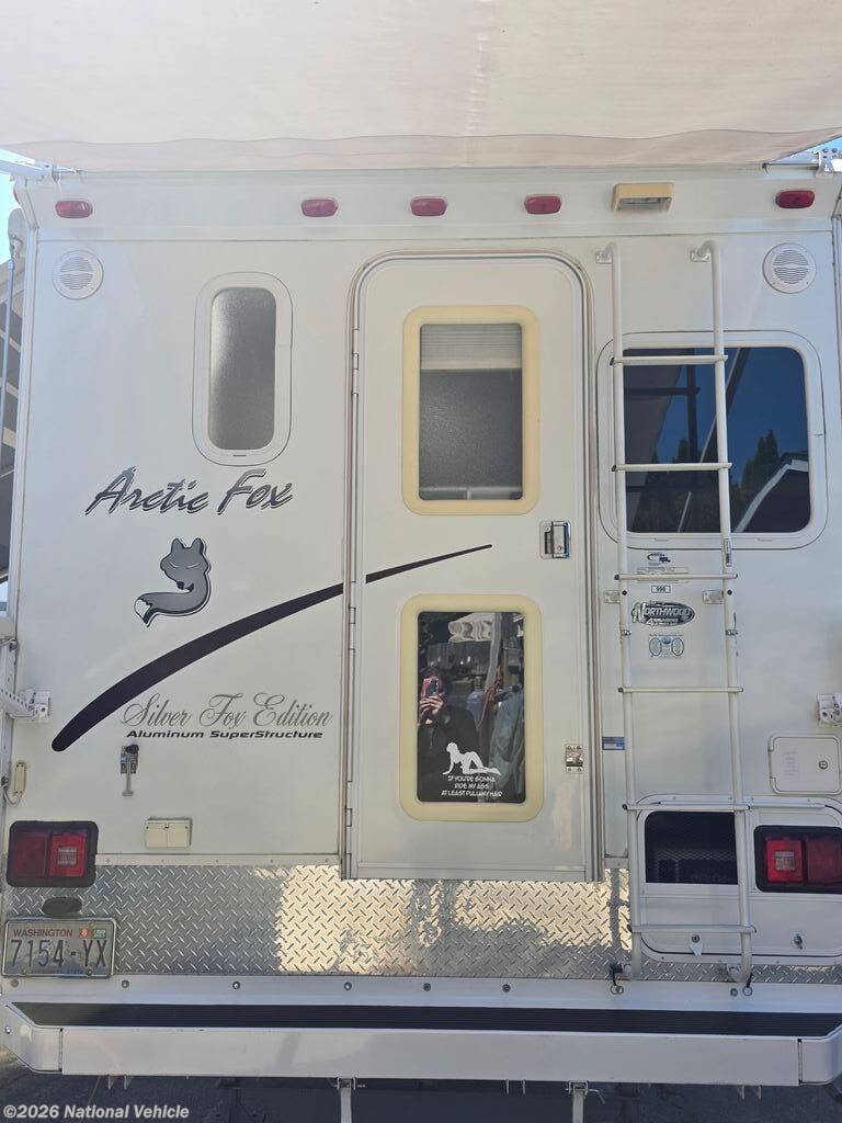 2007 Arctic Fox Truck Camper 990 by Northwood from National Vehicle in Burlington, Washington