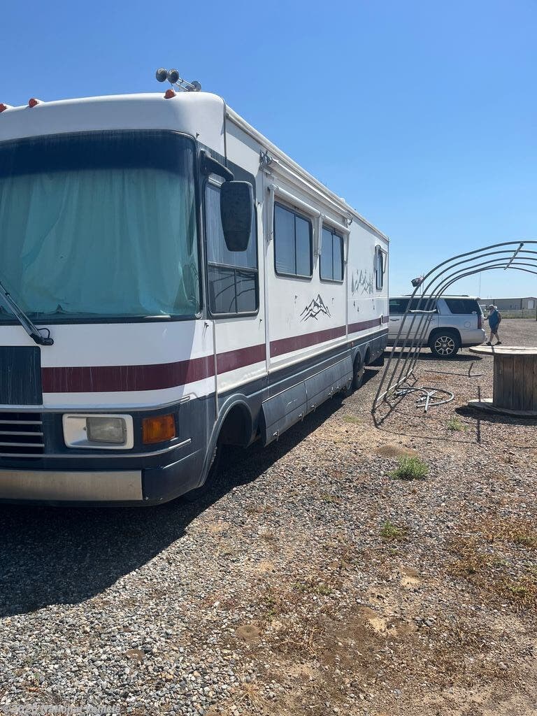 1998 Dolphin 5350 by National RV from National Vehicle in Fredrick, Colorado