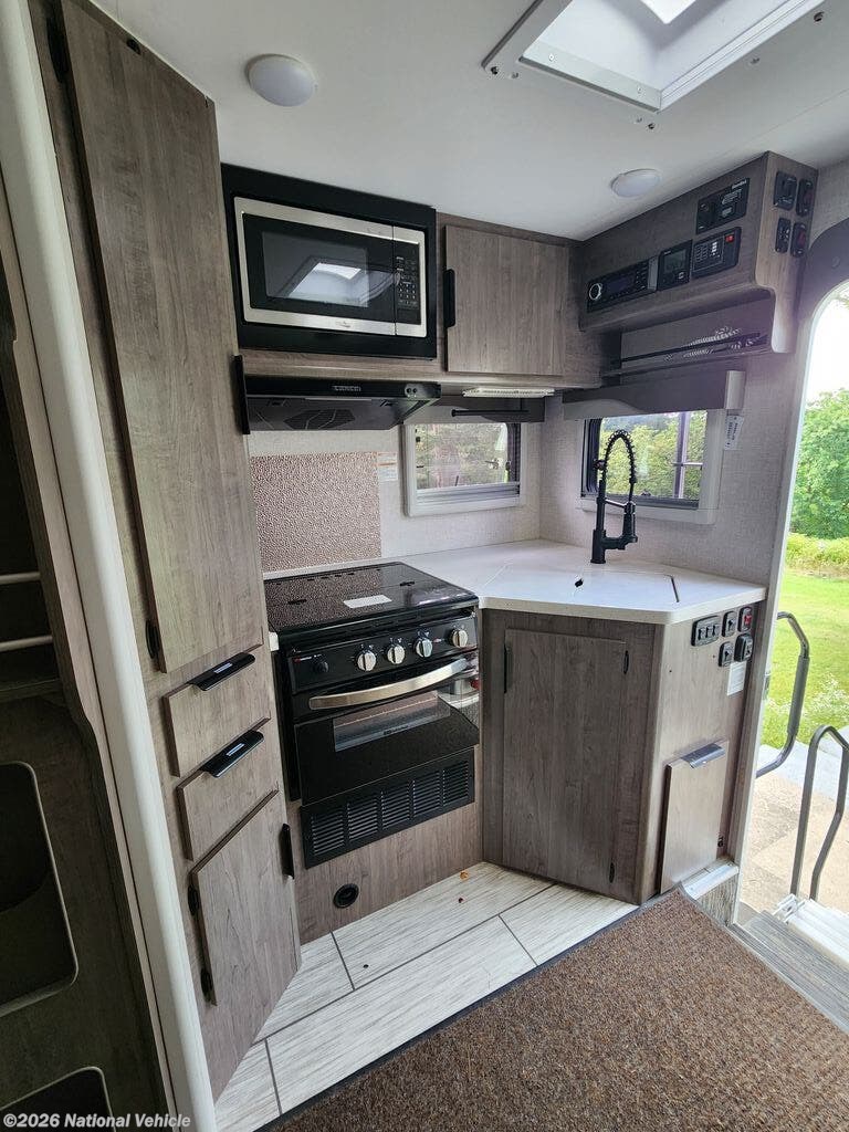 2024 Truck Camper 975 by Lance from National Vehicle in Montoursville, Pennsylvania