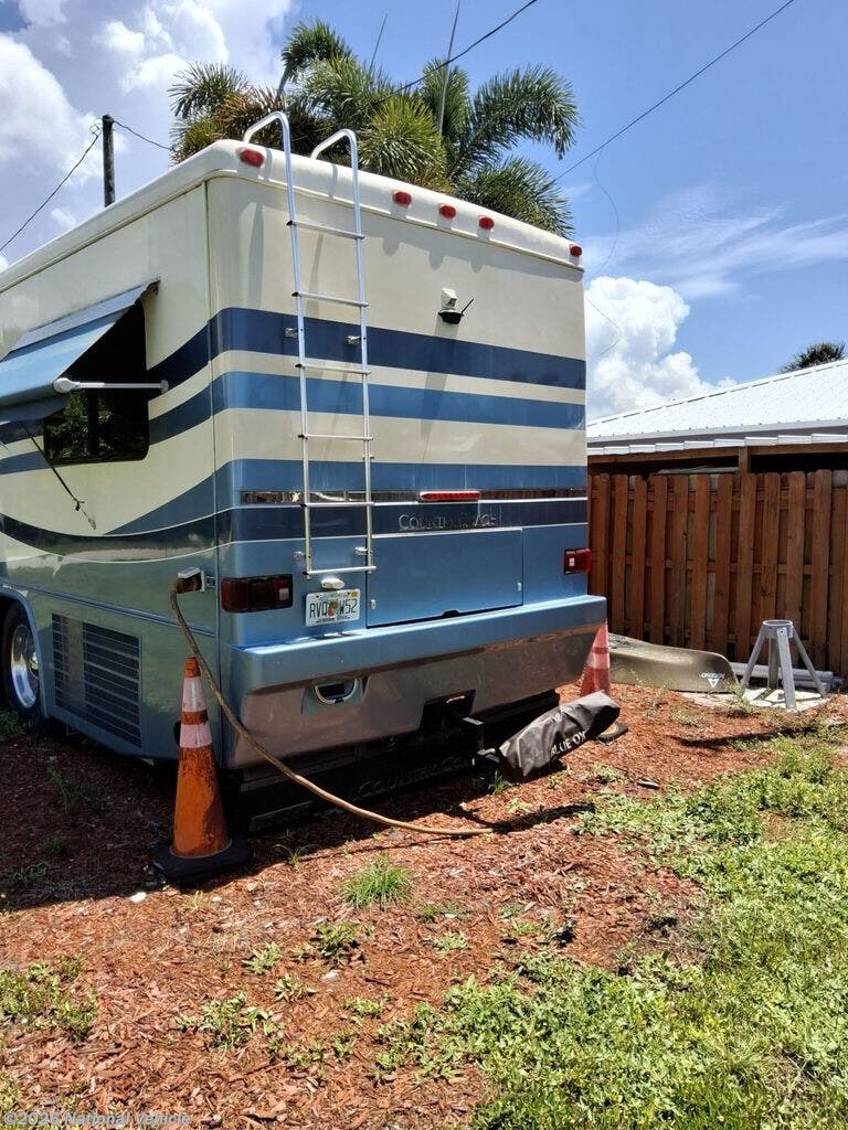2000 Allure 330hp 36' Slide by Country Coach from National Vehicle in Bokeelia, Florida