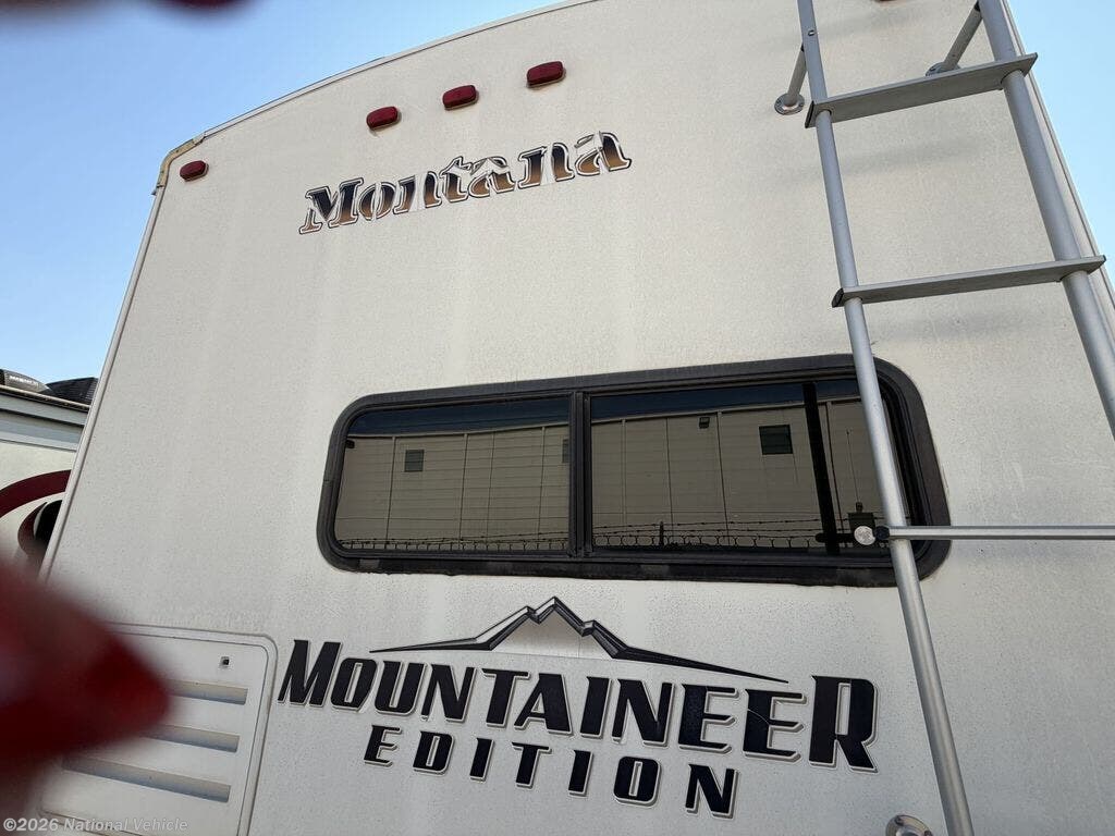 2013 Montana Mountaineer 295RKD by Keystone from National Vehicle in Lincoln, Nebraska