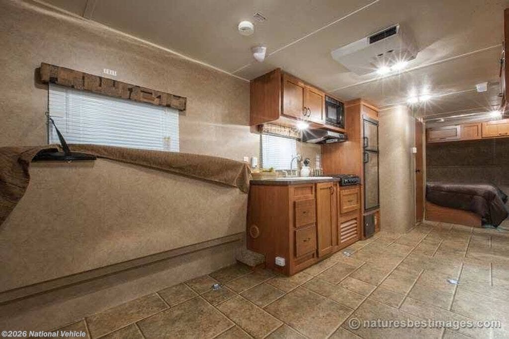 2014 Cherokee Grey Wolf 25RR by Forest River from National Vehicle in Pratt, Kansas