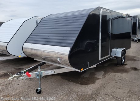 &lt;p&gt;&lt;strong&gt;&lt;span style=&quot;font-size: 18pt;&quot;&gt;2024 Triton TC-167 2 Place Enclosed Aluminum Snowmobile Trailer&lt;/span&gt;&lt;/strong&gt;&lt;br&gt;&lt;br&gt;UPGRADED - Aluminum Wheels&lt;br&gt;UPGRADED - Caliber Snow Package&lt;br&gt;&lt;br&gt;This is a 7x16 hybrid trailer. It&#39;s a cross between a trailer cap and enclosed trailer. These sleek, lightweight and aerodynamic Triton TC trailers combine the best of the Cover models with the benefits of a fully enclosed trailer. Features include an all-aluminum, full-tubular frame with a rear drop down ramp and torsion axles and more....&lt;br&gt;&lt;br&gt;Call us regarding other snowmobile trailers coming in.&lt;/p&gt;
&lt;p&gt;&lt;strong&gt;Great Deal on this sled trailer! Get yours before the snow flies!&lt;/strong&gt;&lt;/p&gt;
&lt;ul&gt;
&lt;li&gt;&lt;strong&gt;Side Door&lt;/strong&gt;&lt;/li&gt;
&lt;li&gt;&lt;strong&gt;Hinge Protector&lt;/strong&gt;&lt;/li&gt;
&lt;li&gt;&lt;strong&gt;Full Length tracks for tie downs&lt;/strong&gt;&lt;/li&gt;
&lt;li&gt;&lt;strong&gt;Tongue Jack&lt;/strong&gt;&lt;/li&gt;
&lt;/ul&gt;
&lt;p&gt;&lt;strong&gt;5 Year Limited Triton Warranty&lt;/strong&gt;&lt;/p&gt;
&lt;p style=&quot;text-align: center;&quot;&gt;&lt;strong&gt;Call our Sales Team for more Information! 651-464-6009&lt;/strong&gt;&lt;/p&gt;
&lt;p style=&quot;text-align: center;&quot;&gt;Large Selection of Trailers in Stock for Immediate Delivery&lt;/p&gt;
&lt;p style=&quot;text-align: center;&quot;&gt;Easy on site financing available. &amp;nbsp;Call for quick &amp;amp; easy pre-approval!&lt;/p&gt;
&lt;p style=&quot;text-align: center;&quot;&gt;WWW.FORESTLAKETRAILER.COM&lt;/p&gt;
&lt;p style=&quot;text-align: center;&quot;&gt;651-464-6009&lt;/p&gt;
&lt;p style=&quot;text-align: center;&quot;&gt;15131 Feller Street&lt;/p&gt;
&lt;p style=&quot;text-align: center;&quot;&gt;Forest Lake,MN. 55025&lt;/p&gt;
&lt;p style=&quot;text-align: center;&quot;&gt;Call for availability as our inventory is always changing.&lt;/p&gt;
&lt;p style=&quot;text-align: center;&quot;&gt;Financing terms are simply an estimate and are by no means a commitment to a specific interest rate or term. &amp;nbsp;Forest Lake Trailer is not responsible for errors, misprints or typos in our advertising.&lt;/p&gt;