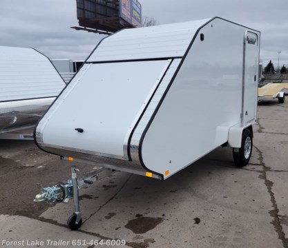 &lt;p&gt;&lt;span style=&quot;font-size: 20px;&quot;&gt;&lt;strong&gt;2024 Triton TC-125 Enclosed Aluminum 1 Place Sled Trailer&lt;/strong&gt;&lt;/span&gt;&lt;/p&gt;
&lt;p&gt;&lt;span style=&quot;font-size: 14px;&quot;&gt;UPGRADE - Aluminum Wheels&amp;nbsp;&lt;/span&gt;&lt;/p&gt;
&lt;ul&gt;
&lt;li&gt;1 Place sled trailer&lt;/li&gt;
&lt;li&gt;Dual air vents for air flow and moisture control.&lt;/li&gt;
&lt;li&gt;Roof is contoured for improved towing aerodynamics reducing gas consumption.&lt;/li&gt;
&lt;li&gt;Highly visible sealed LED lights on entire trailer.&lt;/li&gt;
&lt;li&gt;Double seal door design prevents leaks, keeps cargo area dry.&lt;/li&gt;
&lt;li&gt;Flexible rubber bridge between ramp door and deck to keep hinge area free of debris.&lt;/li&gt;
&lt;li&gt;Build in transition for smooth loading.&lt;/li&gt;
&lt;/ul&gt;
&lt;p style=&quot;text-align: left;&quot;&gt;&lt;strong&gt;5 Year Manufacturers Warranty&lt;/strong&gt;&lt;/p&gt;
&lt;p style=&quot;text-align: center;&quot;&gt;&lt;strong&gt;Call our Sales Team for more information!&lt;/strong&gt;&lt;/p&gt;
&lt;p style=&quot;text-align: center;&quot;&gt;&lt;strong&gt;651-464-6009&lt;/strong&gt;&lt;/p&gt;
&lt;p style=&quot;text-align: center;&quot;&gt;&lt;strong&gt;www.FORESTLAKETRAILER.com&lt;/strong&gt;&lt;/p&gt;
&lt;p style=&quot;text-align: center;&quot;&gt;&lt;strong&gt;Forest Lake Trailer&lt;/strong&gt;&lt;/p&gt;
&lt;p style=&quot;text-align: center;&quot;&gt;&lt;strong&gt;651-464-6009&lt;/strong&gt;&lt;/p&gt;
&lt;p style=&quot;text-align: center;&quot;&gt;&lt;strong&gt;15131 Feller Street&lt;/strong&gt;&lt;/p&gt;
&lt;p style=&quot;text-align: center;&quot;&gt;&lt;strong&gt;Forest Lake, MN. 55025&lt;/strong&gt;&lt;/p&gt;
&lt;p style=&quot;text-align: center;&quot;&gt;&lt;strong&gt;Call for availability as our inventory is always changing.&lt;/strong&gt;&lt;/p&gt;
&lt;p style=&quot;text-align: center;&quot;&gt;&lt;strong&gt;Large selection of trailers in stock ready for immediate delivery.&lt;/strong&gt;&lt;/p&gt;
&lt;p style=&quot;text-align: left;&quot;&gt;&lt;strong&gt;Financing terms are simply an estimate&amp;nbsp;and are by no means a commitment to a specific interest rate or term. &amp;nbsp;Forest Lake Trailer is not responsible for any typos, errors or misprints found in our ads.&lt;/strong&gt;&lt;/p&gt;