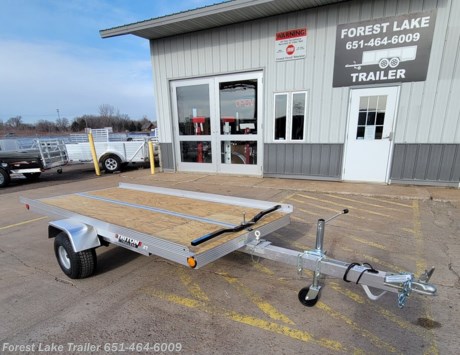 &lt;p&gt;&lt;span style=&quot;font-size: 18pt;&quot;&gt;&lt;strong&gt;2024 Triton XT 4.5 Tilt Snowmobile Trailer&lt;/strong&gt;&lt;/span&gt;&lt;/p&gt;
&lt;p&gt;UPGRADED - Tongue Jack&amp;nbsp;&lt;/p&gt;
&lt;p&gt;Triton 5 Year Warranty&lt;/p&gt;
&lt;p&gt;1x Ski Bar&lt;/p&gt;
&lt;p&gt;Aluminum Frame/ Wood Deck&lt;/p&gt;
&lt;p&gt;Limited Lifetime warranty on the wood deck.&lt;/p&gt;
&lt;p&gt;LED Lights&lt;/p&gt;
&lt;p style=&quot;text-align: center;&quot;&gt;Call our sales team now to find out more!&lt;/p&gt;
&lt;p style=&quot;text-align: center;&quot;&gt;651-464-6009&lt;/p&gt;
&lt;p style=&quot;text-align: center;&quot;&gt;WWW.FORESTLAKETRAILER.COM&lt;/p&gt;
&lt;p style=&quot;text-align: center;&quot;&gt;651-464-6009&lt;/p&gt;
&lt;p style=&quot;text-align: center;&quot;&gt;Forest Lake Trailer&lt;/p&gt;
&lt;p style=&quot;text-align: center;&quot;&gt;15131 Feller Street&lt;/p&gt;
&lt;p style=&quot;text-align: center;&quot;&gt;Forest Lake, MN 55025&lt;/p&gt;
&lt;p style=&quot;text-align: center;&quot;&gt;Call for availability as our inventory is always changing.&lt;/p&gt;
&lt;p&gt;Financing terms are simply an estimate and are by no means a commitment to a specific interest rate or terms. &amp;nbsp;Forest Lake Trailer is not responsible for any typos, errors or misprints found in our advertising.&lt;/p&gt;
&lt;p&gt;Disclaimer: While every reasonable effort is made to ensure the accuracy of this data, we are not responsible for any errors or omissions regarding pricing, vehicle photos, accessories, parts or equipment. Every vehicle ad lists the price of the specific vehicle at the time the ad is posted. Please call first to verify availability and current pricing. Prices do not include motor vehicle tax, title and license fees, or any applicable credit card or finance fees. Dealer is not responsible for pricing errors.&amp;nbsp;&lt;/p&gt;
&lt;p style=&quot;text-align: center;&quot;&gt;&amp;nbsp;&lt;/p&gt;
&lt;p style=&quot;text-align: center;&quot;&gt;&amp;nbsp;&lt;/p&gt;