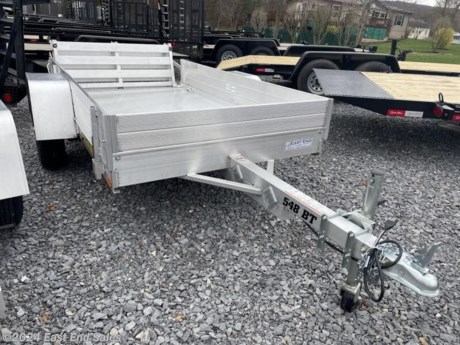 * All aluminum build\n* Aluminum extruded floor\n* 2000lb rubber torsion axle\n* 12in solid side kit\n* 48in long A frame tongue\n* 2in ball coupler\n* LED lights\n* Swivel up jack\n* Tie down loops in bed\n* Bi-fold rear gate\n* ST175/80R13 radials\n* 5 year manufacturer warranty\n\nAdditional 3% charge on all card transactions\*