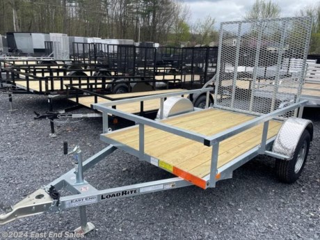 * Galvanized frame\n* Tube top rail\n* 48in A frame\n* 2in ball coupler\n* 3500lb Dexter EZ lube axle\n* Spring suspension\n* Rear ramp gate with spring assist\n* Spare tire mount\n* 2000lb set back jack\n* 4 flat plug\n* Safety chains\n* 205/75R15 radials\n\nAdditional 3% charge on all card transactions\*