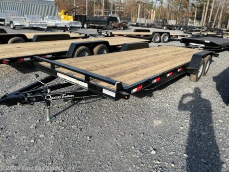 Heavier frame, wrap-around channel tongue, swing up jack, radial tires, rubber mounted sealed beam lighting in enclosed light boxes, conventional wiring with gel filled connectors.
GVWR 7000 lb. – Capacity 6000 lb. with 1000 lb. Hitchload
Must support rear of trailer when loading vehicle over 4,000 lb.
Treated wood deck
Flat deck, no dovetail
82? between fenders
3500 lb. braking axles with 4 wheel brakes
Double eye spring suspension
205/75 R15 load range C 6 ply rating Castle Rock Radial tires
5? channel frame
3? channel cross members – 24? spacing
4? channel wrap-around tongue
5 ft. rear slide-in ladder-style ramps
2 5/16? A-frame coupler
Swing-up jack
Diamond plate fenders with backs
Steps in front and behind fenders
Stake pockets, self charging break away kit, safety chains, skip DOT reflective tape and all rubber mounted sealed beam lighting with conventional wiring with gel filled connectors
Primed, 2 coats of acrylic enamel, pin striped