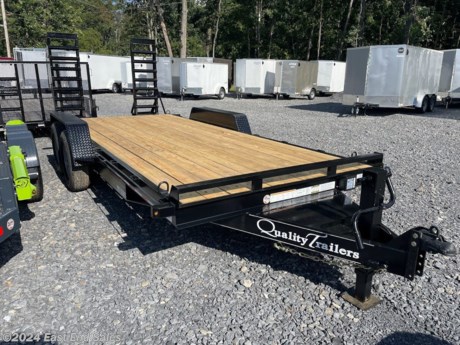 * Treated wood deck
* 82in between fenders
* 6in channel frame
* 3in channel crossmembers - 16in OC
* 6in channel wrap around tongue
* Toolbox with lockable lid
* 7000lb EZ lube axles
* Electric brakes on both axles
* Slipper spring suspension
* 2 5/16in adjustable ball coupler
* 12000lb drop leg jack
* LED lighting
* 5ft swing up ramps with spring assist and support foot
* Self charge emergency breakaway kit
* HD fenders with steps
* 235/80R16 radials E ply

Additional 3% charge on all card transactions*