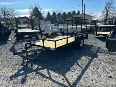 Heavy-duty tube top rail and uprights
12” high sides
2” X 8” treated yellow pine floor
4’ long mesh fold flat ramp with spring assist
3.5K Dexter EZ Lube axles
15” white mod wheels
205/75R15 load range c Radial tires
2K bolt on, set back jack
2” A-frame coupler
Removable zinc plated safety chains with stow hooks
High-quality urethane paint primer and top coat
Sealed Phillips&#174; modular wiring harness
Grommet mounted LED lights
Diamond plate fender steps
Spare tire mount
These are all cash prices.
Cards are extra 3%