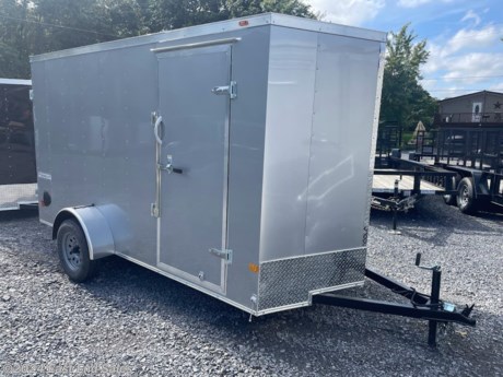 * V front
* Steel Z post frame
* 2x3in main tube rails
* Crossmembers 16in OC 
* .030 aluminum exterior
* Flat roof
* One piece aluminum roof
* 3500lb EZ lube non braking axle
* Rear barn doors
* 2in ball coupler
* 6.5ft inside height
* Side door 32 x72 with bar lock
* 3/4in PlexCore decking
* 3/8in PlexCore sidewall
* 4 - 5000lb floor mounted D rings
* LED lighting
* 12V dome light inside
* 4 flat plug
* ST205/75R15 mod wheels

Additional 3% charge on all card transactions*