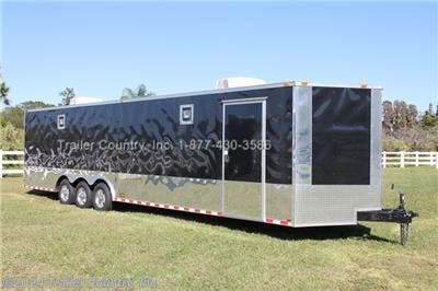 &lt;div&gt;NEW 8.5 X 32&#39; V- NOSED ENCLOSED CAR HAULER TRAILER W/ RACE READY 2 PACKAGE&amp;nbsp;&lt;/div&gt;
&lt;div&gt;&amp;nbsp;&lt;/div&gt;
&lt;div&gt;Up for your consideration is a Brand New Heavy Duty Model 8.5 x 32 Triple Axle, V-Nosed Enclosed MotorCycle, Snowmobile, Landscape, ATV 4-Wheeler, Car Hauler Cargo Race Trailer.&lt;/div&gt;
&lt;div&gt;&amp;nbsp;&lt;/div&gt;
&lt;div&gt;YOU&#39;VE SEEN THE REST...NOW BUY THE BEST!&lt;/div&gt;
&lt;div&gt;&amp;nbsp;&lt;/div&gt;
&lt;div&gt;ALL the TOP QUALITY FEATURES listed in this ad!&lt;/div&gt;
&lt;div&gt;&amp;nbsp;&lt;/div&gt;
&lt;div&gt;&amp;nbsp;&lt;/div&gt;
&lt;div&gt;&amp;nbsp;&lt;/div&gt;
&lt;div&gt;ELITE SERIES:&lt;/div&gt;
&lt;div&gt;&amp;nbsp;&lt;/div&gt;
&lt;div&gt;- Heavy Duty 8&quot; I Beam Main Frame&lt;/div&gt;
&lt;div&gt;- 32&#39; Box Space + V-Nose&lt;/div&gt;
&lt;div&gt;- 16&quot; On Center Walls&lt;/div&gt;
&lt;div&gt;- 16&quot; On Center Floors&lt;/div&gt;
&lt;div&gt;- 16&quot; On Center Roof Bows&lt;/div&gt;
&lt;div&gt;- (3) 5,200lb &quot; DEXTER&quot; SPRING Axles w/ All Wheel Electric Brakes &amp;amp; EZ LUBE Grease Fittings-Self Adusting Axles&lt;/div&gt;
&lt;div&gt;- HEAVY DUTY Rear Spring Assisted Ramp Door with (2) Barlocks for Security, &amp;amp; EZ Lube Hinge Pins&lt;/div&gt;
&lt;div&gt;- No-Show Beaver Tail (Dove Tail)&lt;/div&gt;
&lt;div&gt;- 4 - 5,000lb Flush Floor Mounted D-Rings (Welded to Frame)&lt;/div&gt;
&lt;div&gt;- 36&quot; Side Door with Lock&lt;/div&gt;
&lt;div&gt;- ATP Diamond Plate Recessed Step-Up in Side door&lt;/div&gt;
&lt;div&gt;&amp;nbsp;6&#39;6&quot; Interior Height inside Box Space&lt;/div&gt;
&lt;div&gt;- Galvalume Seamed Roof w/ Thermo Ply Ceiling Liner&lt;/div&gt;
&lt;div&gt;- 2 5/16&quot; Coupler w/ Snapper Pin&lt;/div&gt;
&lt;div&gt;- Heavy Duty Safety Chains&lt;/div&gt;
&lt;div&gt;- 2K Top-Wind Jack&lt;/div&gt;
&lt;div&gt;- 7-Way Round RV Electrical Wiring Harness w/ Battery Back-Up &amp;amp; Safety Switch&lt;/div&gt;
&lt;div&gt;- 24&quot; ATP Front StoneGuard w/ ATP Nose Cap&lt;/div&gt;
&lt;div&gt;- Exterior L.E.D Lighting Package&lt;/div&gt;
&lt;div&gt;- 3/8&quot; Heavy Duty Top Grade Plywood Walls&lt;/div&gt;
&lt;div&gt;- 3/4&quot; Heavy Duty Top Grade Plywood Floors&lt;/div&gt;
&lt;div&gt;- Heavy Duty Smooth Fender Flares&lt;/div&gt;
&lt;div&gt;- Deluxe License Plate Holder with Light&lt;/div&gt;
&lt;div&gt;- Top Quality Exterior Grade Automotive Paint&lt;/div&gt;
&lt;div&gt;- (2) Roof Vent&lt;/div&gt;
&lt;div&gt;- 12-Volt Interior Trailer Light w/ Wall Switch&lt;/div&gt;
&lt;div&gt;- 15&quot; 225-15&quot; Radial Tires&lt;/div&gt;
&lt;div&gt;- Modular Wheels&lt;/div&gt;
&lt;div&gt;&amp;nbsp;&lt;/div&gt;
&lt;div&gt;Race Ready 2 Package:&amp;nbsp;&lt;/div&gt;
&lt;div&gt;&amp;nbsp;&lt;/div&gt;
&lt;div&gt;- RTP-Rubber Tread Plate Flooring&lt;/div&gt;
&lt;div&gt;- RTP-Rubber Tread Plate Ramp &amp;amp; 16&quot; Transitional Flap&lt;/div&gt;
&lt;div&gt;- White Metal Walls &amp;amp; Ceiling&lt;/div&gt;
&lt;div&gt;- 54&quot; Driver-Side Escape Door&lt;/div&gt;
&lt;div&gt;- Electrical Package (w/50 AMP Panel Box, (2)110 Volt Interior Recepts, 25&#39; Life Line, (2)4&#39; 12 Volt L.E.D. Strip Lights w/ Battery)&lt;/div&gt;
&lt;div&gt;- Black Metal Base &amp;amp; Overhead Cabinets&lt;/div&gt;
&lt;div&gt;- (2) 500 Watt Recessed Curb-Side Quartz Lights&lt;/div&gt;
&lt;div&gt;- (1) Pair of 12 Volt Rear Loading Lights&lt;/div&gt;
&lt;div&gt;&amp;nbsp;&lt;/div&gt;
&lt;div&gt;Additional Upgrades Included:&lt;/div&gt;
&lt;div&gt;&amp;nbsp;&lt;/div&gt;
&lt;div&gt;- Insulated Walls&lt;/div&gt;
&lt;div&gt;- Insulated Ceiling&lt;/div&gt;
&lt;div&gt;- 2 ~ Extra -4&#39; 12 Volt L.E.D. Strip Lights for a Total of 4 in the Trailer&lt;/div&gt;
&lt;div&gt;- Aluminum Mag Wheels&lt;/div&gt;
&lt;div&gt;- 24&quot; Anodized Metal Sides &amp;amp; Rear&lt;/div&gt;
&lt;div&gt;- Radial Tires&lt;/div&gt;
&lt;div&gt;- 2 ~ A/C Unit, Prewire &amp;amp; Brace (13,500 BTU Unit w/ Heat Strip&lt;/div&gt;
&lt;div&gt;&amp;nbsp;&lt;/div&gt;
&lt;div&gt;&amp;nbsp;&lt;/div&gt;
&lt;p&gt;* * N.A.T.M. Inspected and Certified * *&lt;br /&gt;* * Manufacturers Title and 5 Year Limited Warranty Included * *&lt;br /&gt;* * PRODUCT LIABILITY INSURANCE * *&lt;br /&gt;* * FINANCING IS AVAILABLE W/ APPROVED CREDIT * *&lt;/p&gt;
&lt;p&gt;ASK US ABOUT OUR RENT TO OWN PROGRAM - NO CREDIT CHECK - LOW DOWN PAYMENT&lt;/p&gt;
&lt;p&gt;&lt;br /&gt;Trailer is offered @ factory direct pick up in Willacoochee, GA...We also offer Nationwide Delivery, please contact us for more information.&lt;br /&gt;CALL: 888-710-2112&lt;/p&gt;