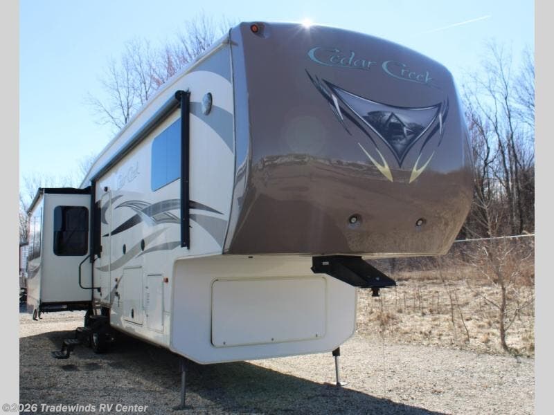 2014 Forest River Cedar Creek 36CKTS - Used Fifth Wheel For Sale by Tradewinds RV Center in Clio, Michigan features Slideout