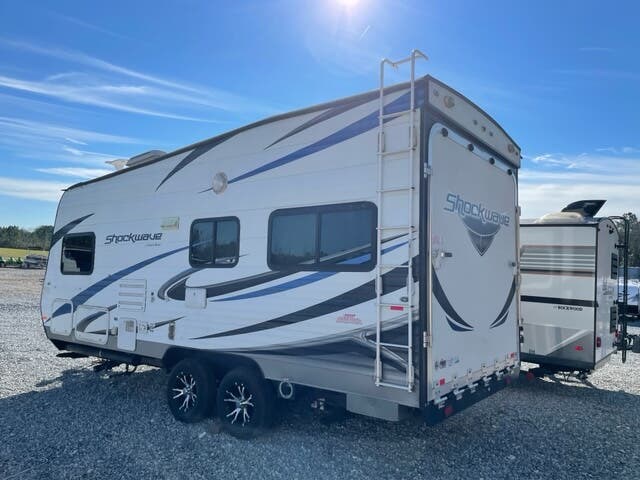 2014 Forest River Shockwave T18SS - Used Toy Hauler For Sale by ASHLEY OUTDOORS LLC - AL in Salem, Alabama features Auxiliary Battery, CO Detector, Microwave, Medicine Cabinet, Refrigerator