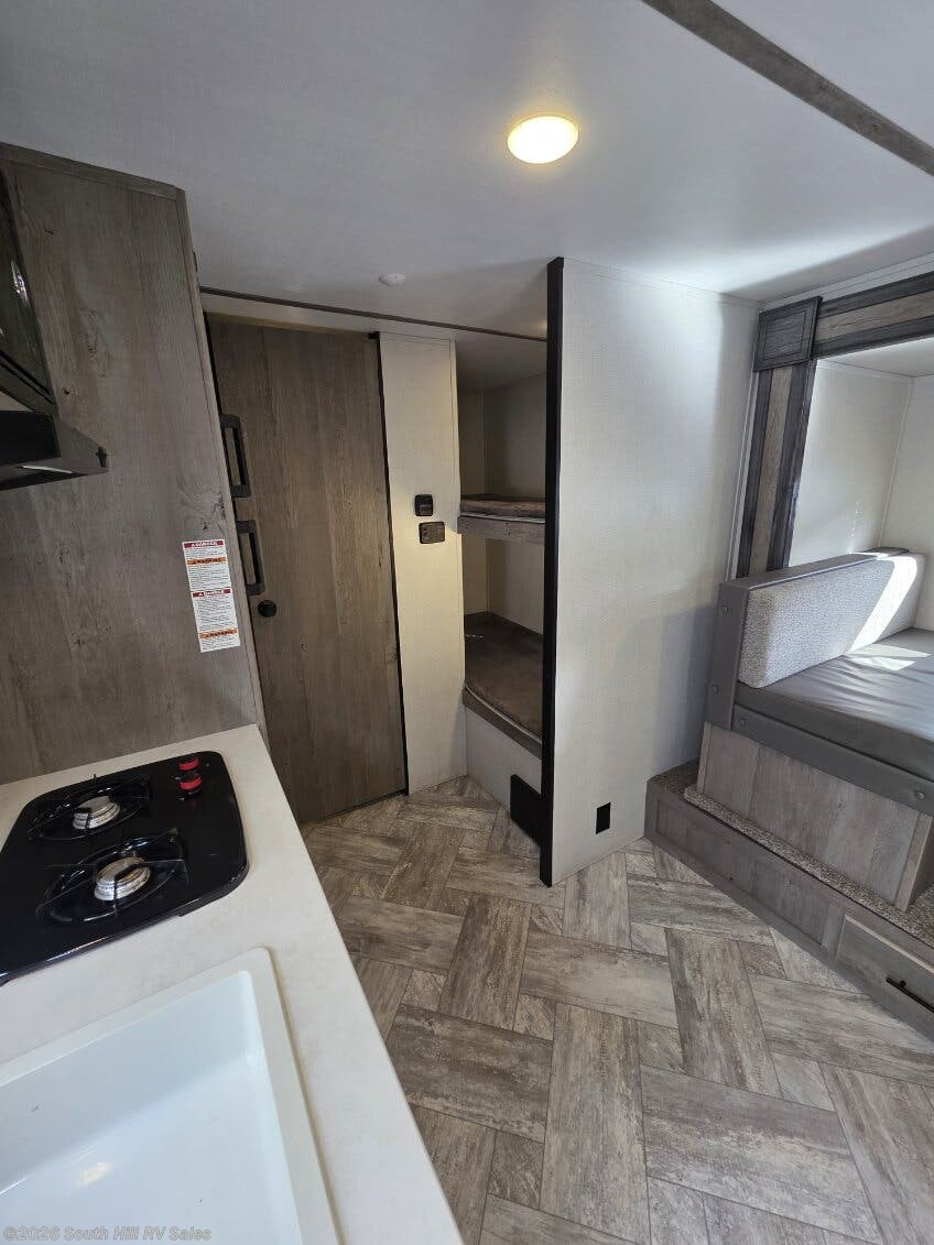 2021 Keystone Springdale Mini 1760BH - Used Travel Trailer For Sale by South Hill RV Sales in Yelm, Washington features Microwave, Bunk Beds, Smoke Detector, Oven, TV