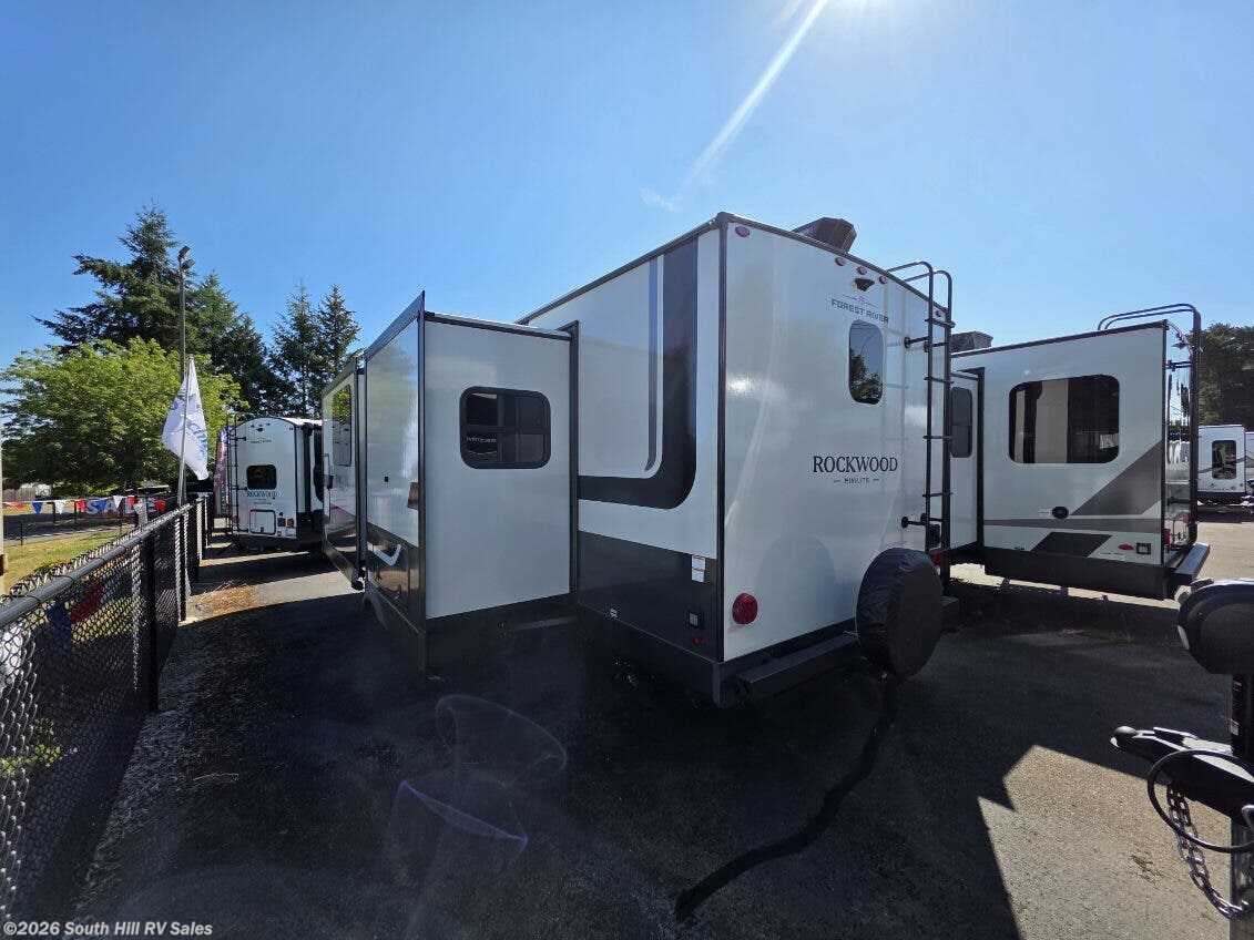 2026 Forest River Rockwood Mini Lite 2523MBR - New Travel Trailer For Sale by South Hill RV Sales in Yelm, Washington features Hitch, Griddle, TV, Solar Panel, Awning