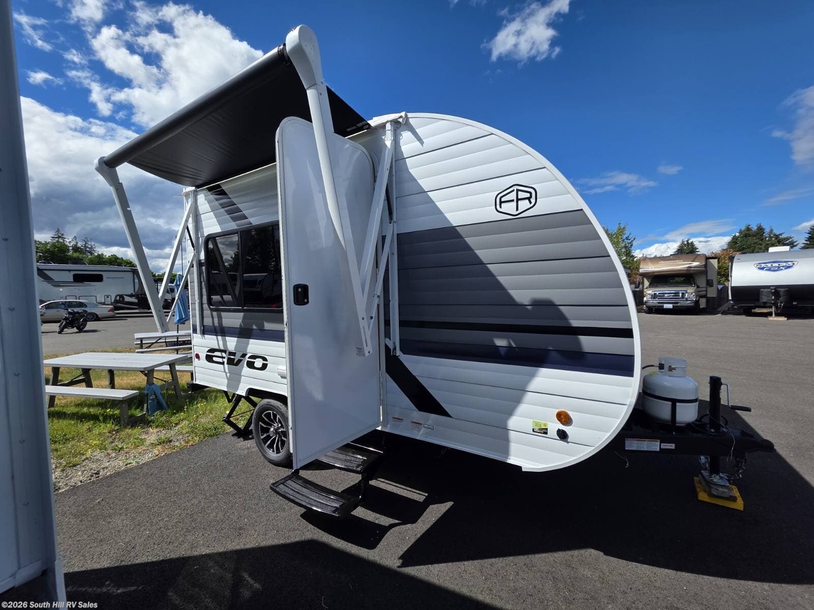 2027 Forest River EVO Factory Select 135ICE - New Travel Trailer For Sale by South Hill RV Sales in Yelm, Washington features Water Heater, CO Detector, Refrigerator, Fire Extinguisher, Leveling Jacks