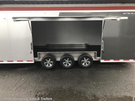 Stealth 8.5 feet wide by 28 feet long with 6 feet 10 inches of interior height sitting on triple 5200# torsion axles with premium wheels. This one has been loaded with a very durable TPO coin flooring and a elite escape door so it easy to get out of your car and makes a great awning as well it also has front cabinets both over head and lower and a wardrobe cabinet and it also has a 110 power package with a battery and upgrade dome lights to 18 inch led lights and rear loading lights and upgrade tail lights with reverse lights and outside work lights and a upgrade side door to a 48 inch rv style door and more

AT DAYSPRING, IT IS OUR GOAL TO HELP YOU FIND THE RIGHT TRAILER FOR YOUR NEEDS.
IF WE DON&#39;T HAVE IT, WE WILL BE MORE THAN HAPPY TO ORDER IT FOR YOU.
WE WANT TO MAKE SURE THAT YOU HAVE THE RIGHT TRAILER AND ACCESSORIES TO FIT YOUR NEEDS.

CONTACT US AND HAVE A GREAT EXPERIENCE BUYING YOUR NEW TRAILER!

TRADES ARE NO PROBLEM; JUST LET US KNOW WHAT YOU HAVE.

FINANCING RATES ARE LOWER THROUGH CREDIT UNIONS .. WE ARE A CERTIFIED CUDL DEALER