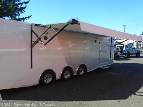 This is a very loaded up 28 foot trailer.It is sitting on triple 5200# torsion spread axles with brakes on all axles. It has the following extras all aluminum inside walls and ceiling, carpet on the first 3 feet of the walls rear ramp with a 4 foot aluminum starter flap,front cabinets both over head and lower with a wardrobe cabinet as well as a craftsman toolbox, lights over the counter top and a large 4 door cabinet over the wheel well, black tpo coin floor,upgrade 48 inch side rv door with a bar lock and a pull out step,rear custom canopy with loading lights in it and the spring cover, 5 18 inch led dome lights,12 puck lights on the walls,stereo system with 4 speakers inside and 2 kicker speakers outside,50amp 110 package with a battery and 2 foot led 110 lights and a convert so all your 12 volt lights work when you are on 110 power,21 foot power awning with lights under it, 2 scene led work lights,porch light,2 tone paint,rear bogey wheels, electric power jack,all corrosion resistant hardware,premium tail lights with reverse lights, and more. This is a custom trailer must see this one # T-1000

AT DAYSPRING, IT IS OUR GOAL TO HELP YOU FIND THE RIGHT TRAILER FOR YOUR NEEDS.
IF WE DON&#39;T HAVE IT, WE WILL BE MORE THAN HAPPY TO ORDER IT FOR YOU.
WE WANT TO MAKE SURE THAT YOU HAVE THE RIGHT TRAILER AND ACCESSORIES TO FIT YOUR NEEDS.

CONTACT US AND HAVE A GREAT EXPERIENCE BUYING YOUR NEW TRAILER!

TRADES ARE NO PROBLEM; JUST LET US KNOW WHAT YOU HAVE.

FINANCING RATES ARE LOWER THROUGH CREDIT UNIONS .. WE ARE A CERTIFIED CUDL DEALER