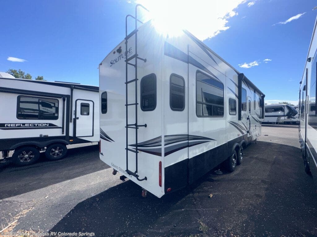 2023 Grand Design Solitude S-Class 3330RE-R - Used Fifth Wheel For Sale by Blue Compass RV Colorado Springs in Colorado Springs, Colorado features Slideout