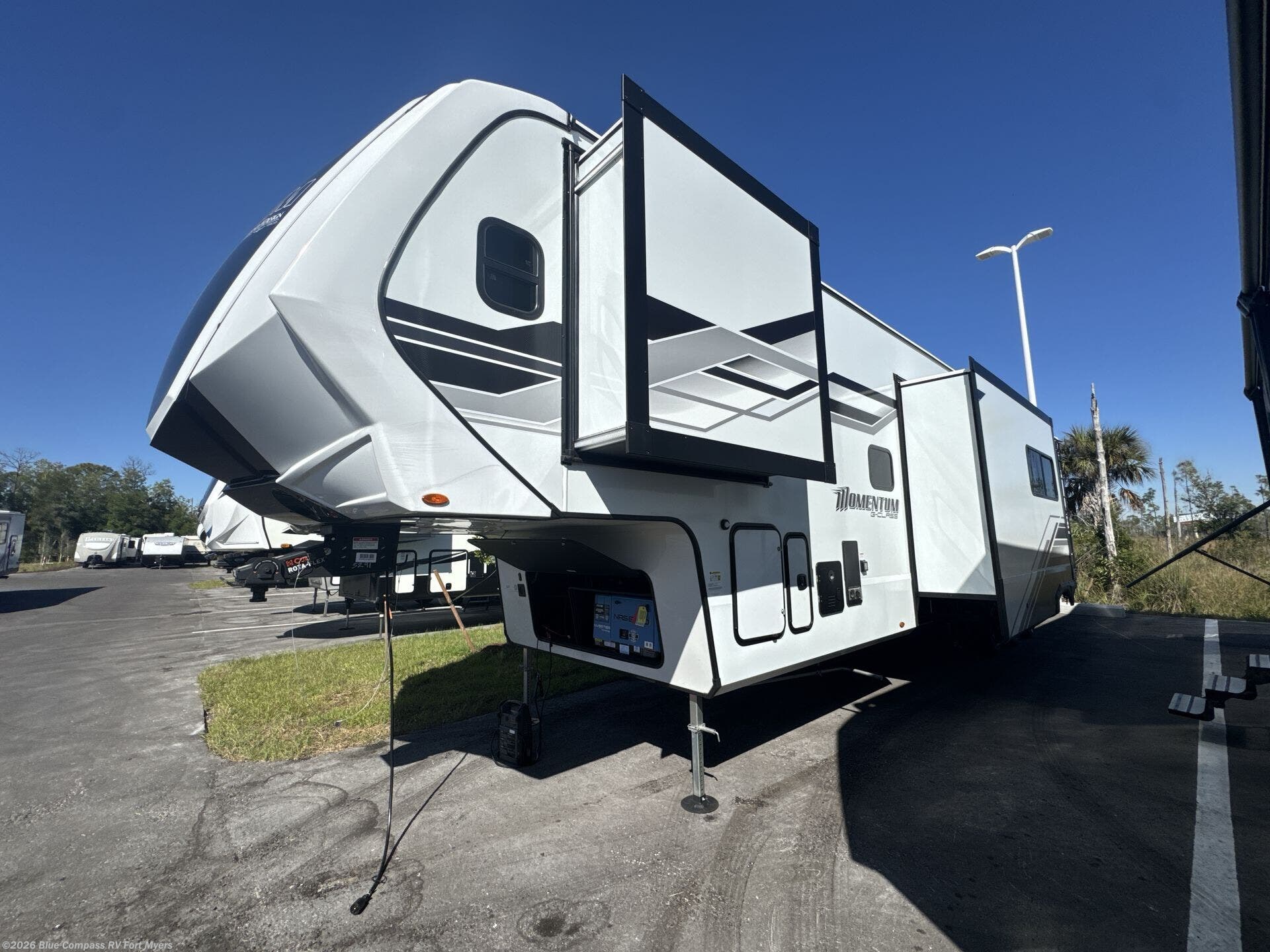 2026 Momentum G-Class 394G by Grand Design from Blue Compass RV Fort Myers in Fort Myers, Florida