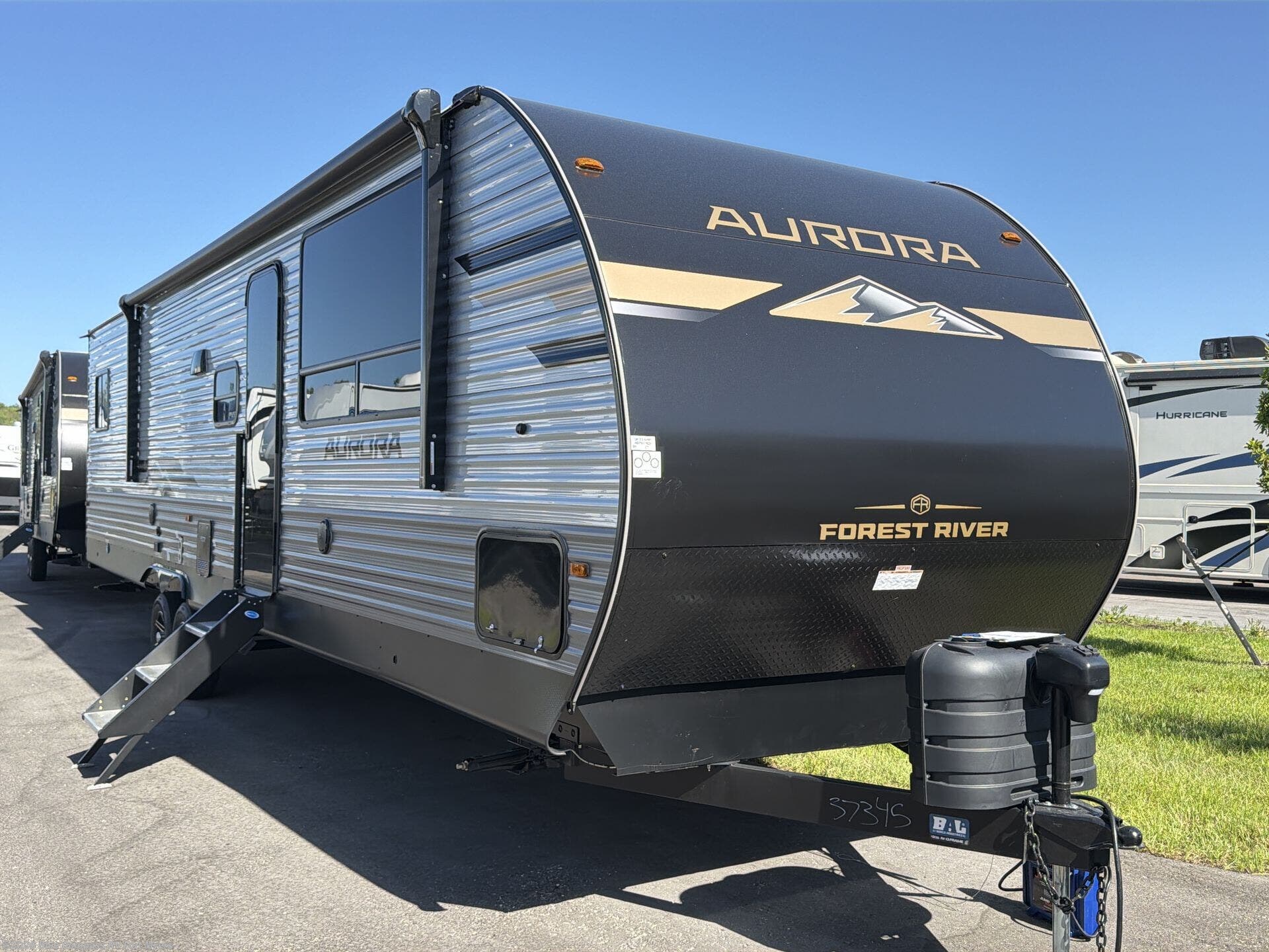 2026 Aurora 34BHTS (2 Queen Beds) by Forest River from Blue Compass RV Fort Myers in Fort Myers, Florida
