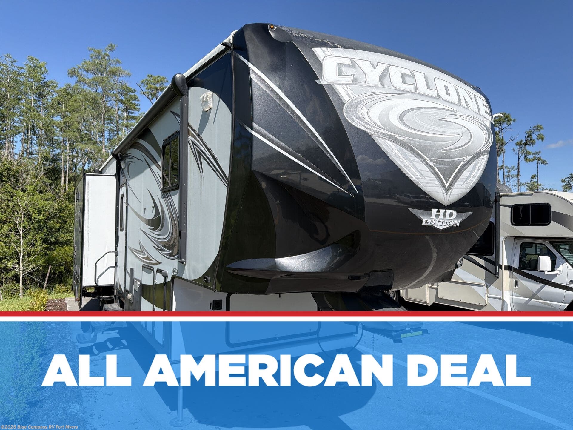 2013 Heartland Cyclone 3110 - Used Toy Hauler For Sale by Blue Compass RV Fort Myers in Fort Myers, Florida features Slideout