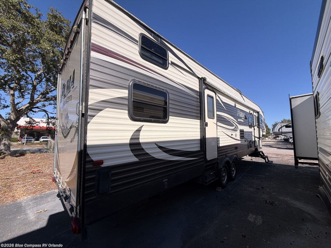 2015 Puma Unleashed 351-THSS by Palomino from Blue Compass RV Orlando in Casselberry, Florida